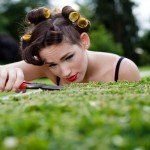 Pedantic housewife gardening. Trimming the bush to perfect